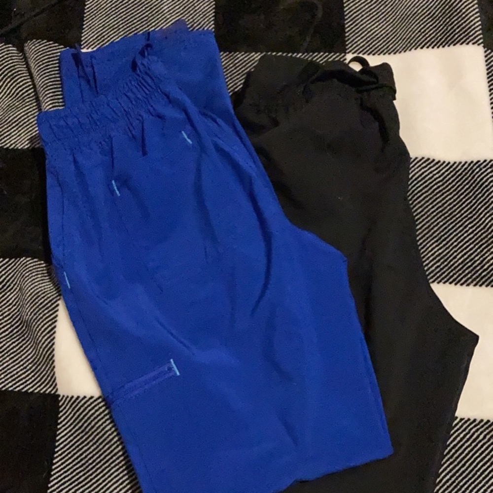 Two sets of small scrub bottoms